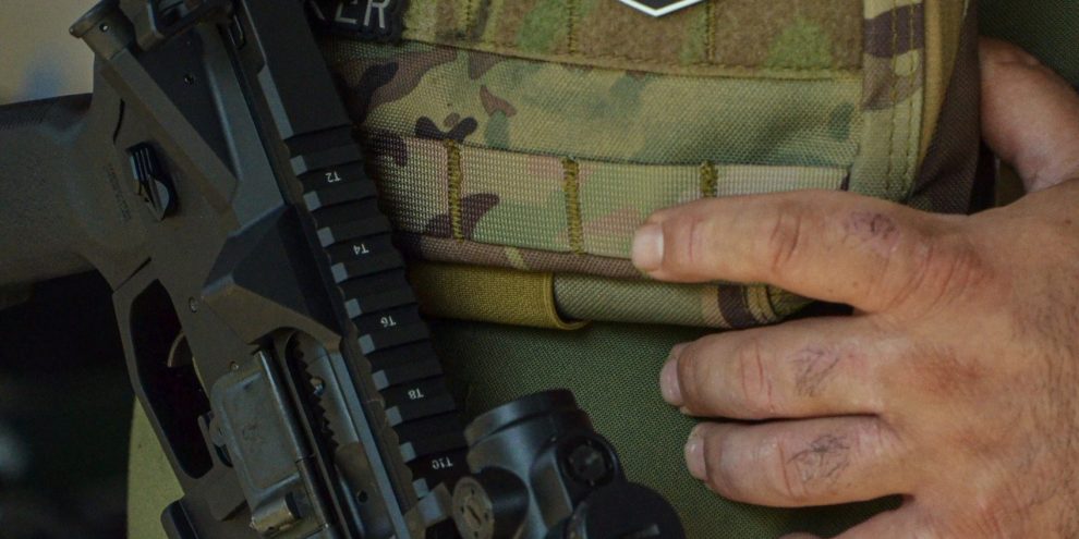 rifle shown with body armour
